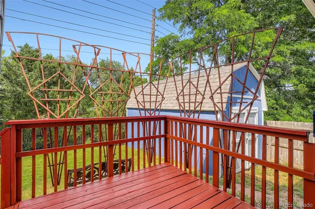 a aerial view of a house with a yard