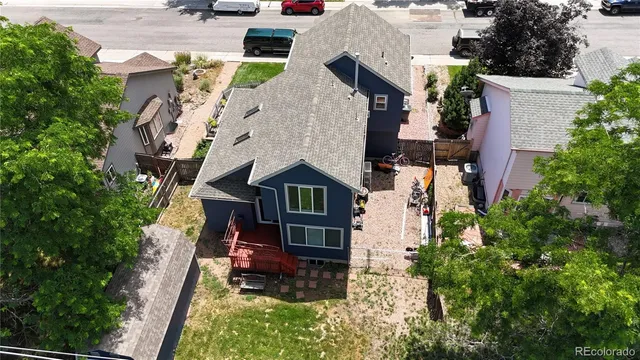 a view of backyard with deck