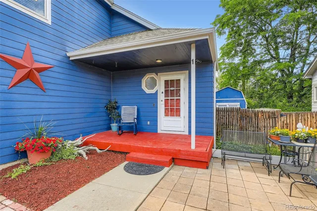 a backyard of a house with seating space