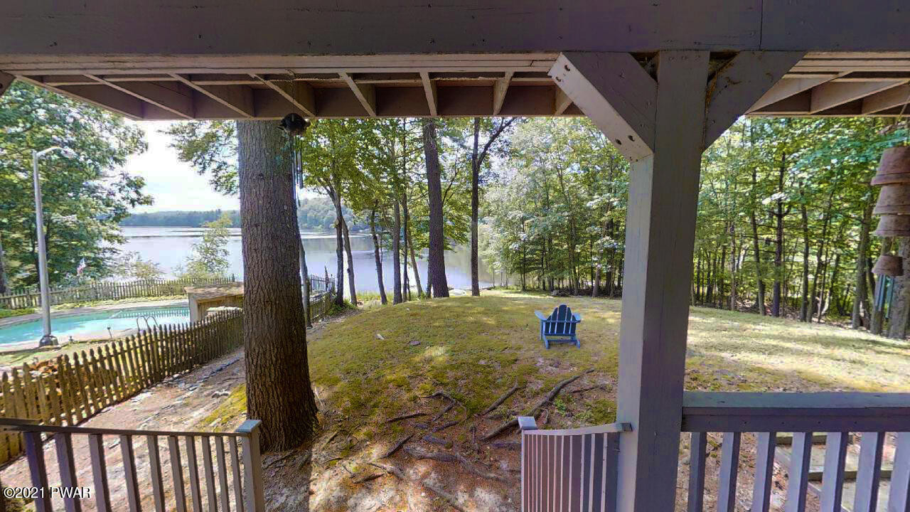 117 Crossing Road Dingmans Ferry, PA 18328 - Photo 22 of 32 a view of a porch and garden