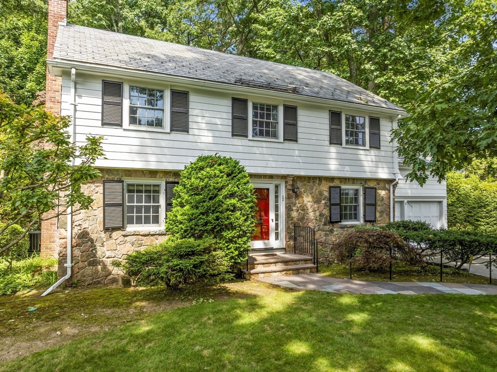 33 Thackeray Road Wellesley, MA 02481 - Photo 1 of 20 a front view of a house with garden