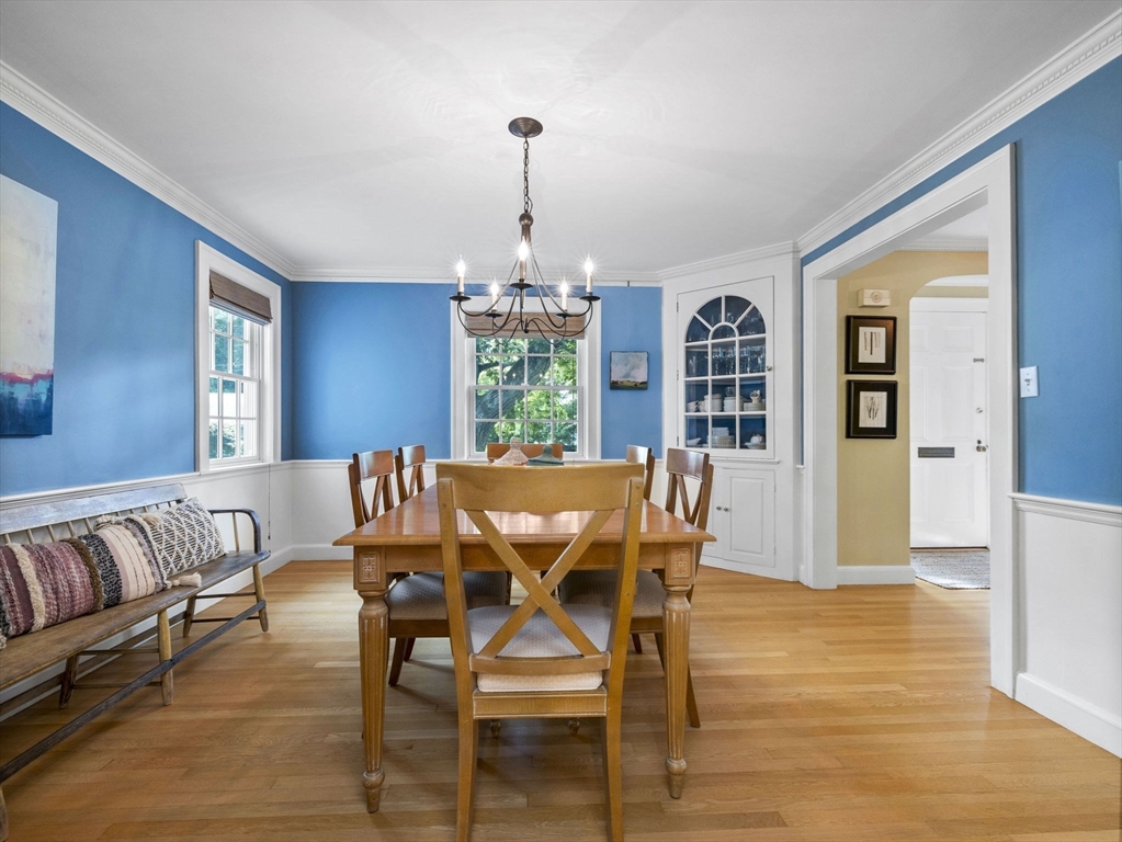 33 Thackeray Road Wellesley, MA 02481 - Photo 15 of 20 a view of a dining room with furniture window and wooden floor