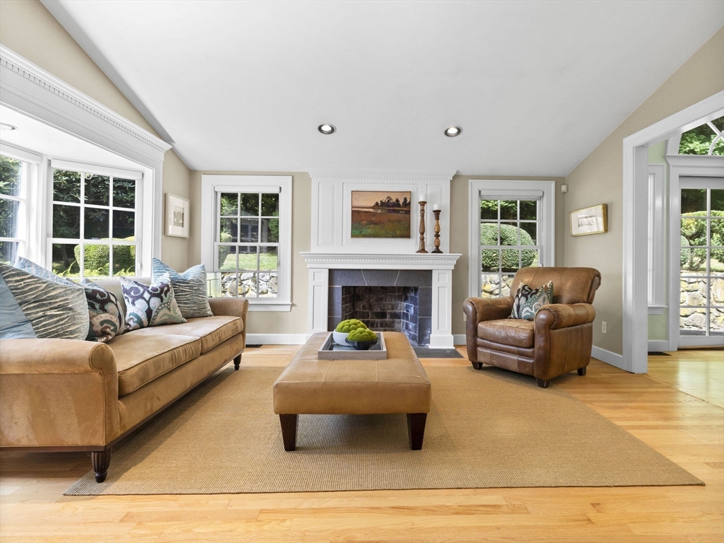 33 Thackeray Road Wellesley, MA 02481 - Photo 9 of 20 a living room with furniture and a fireplace