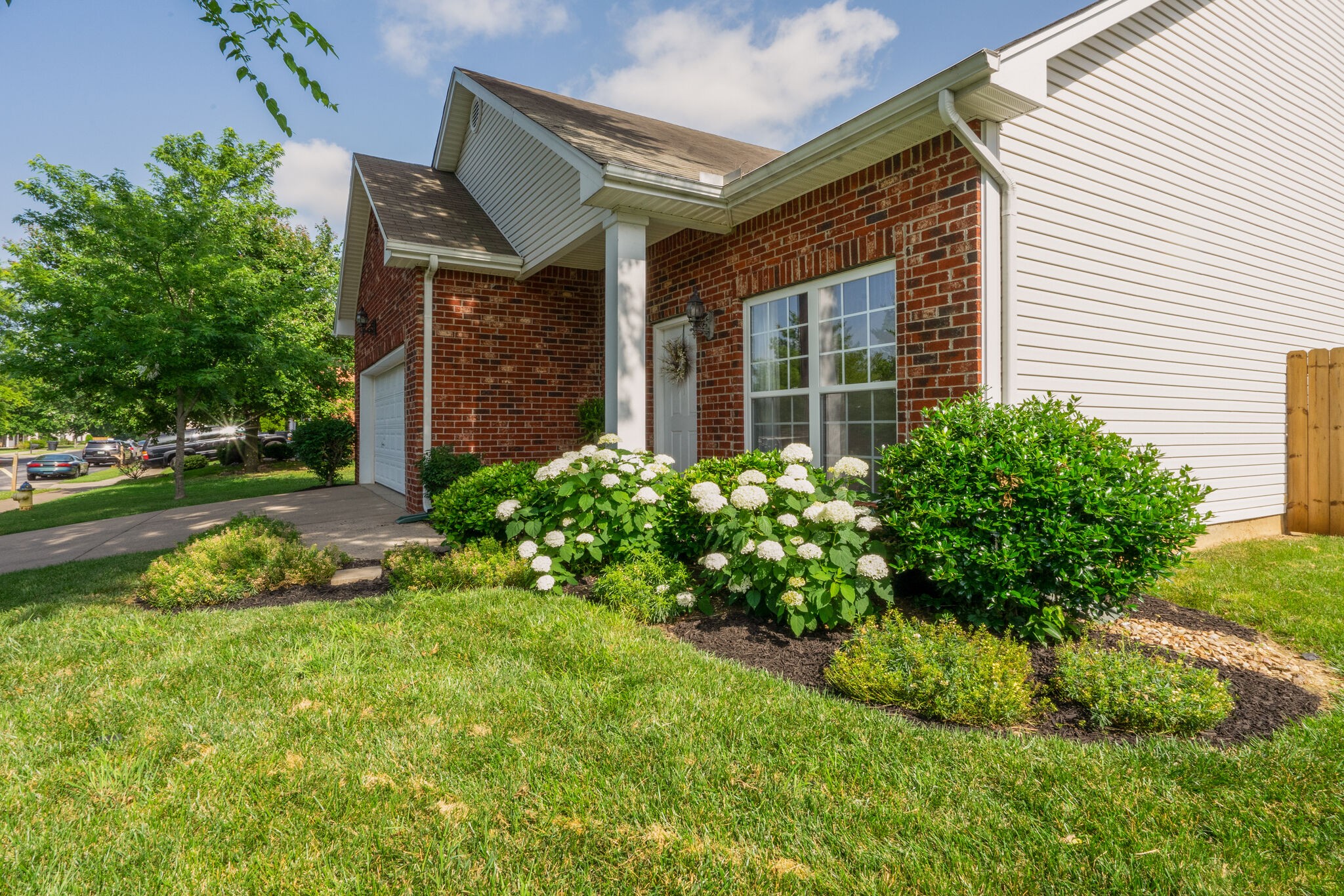 306 Cherry Drive Franklin, TN 37064 - Photo 2 of 30 a front view of a house with garden