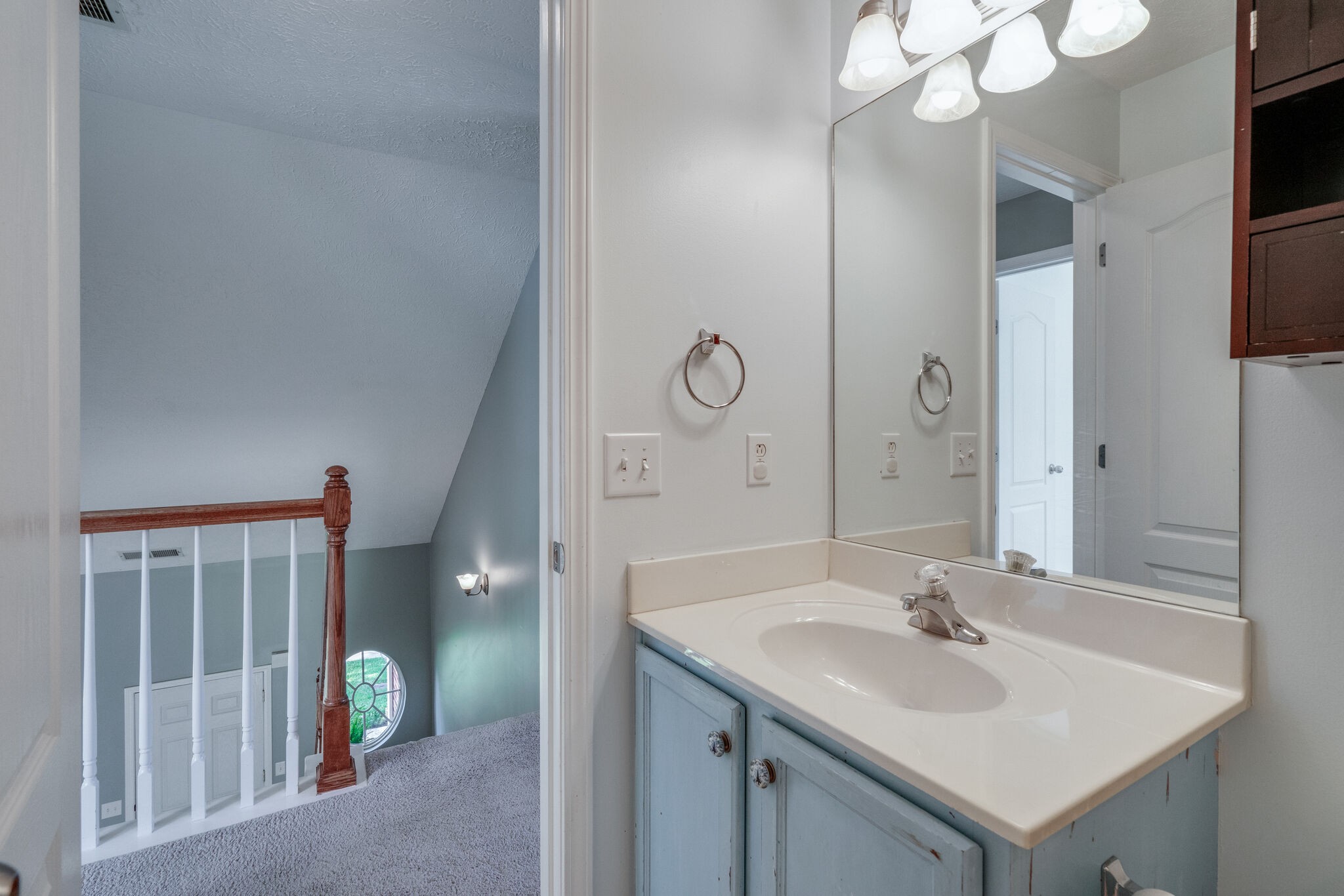 306 Cherry Drive Franklin, TN 37064 - Photo 21 of 30 a bathroom with a sink vanity and a mirror