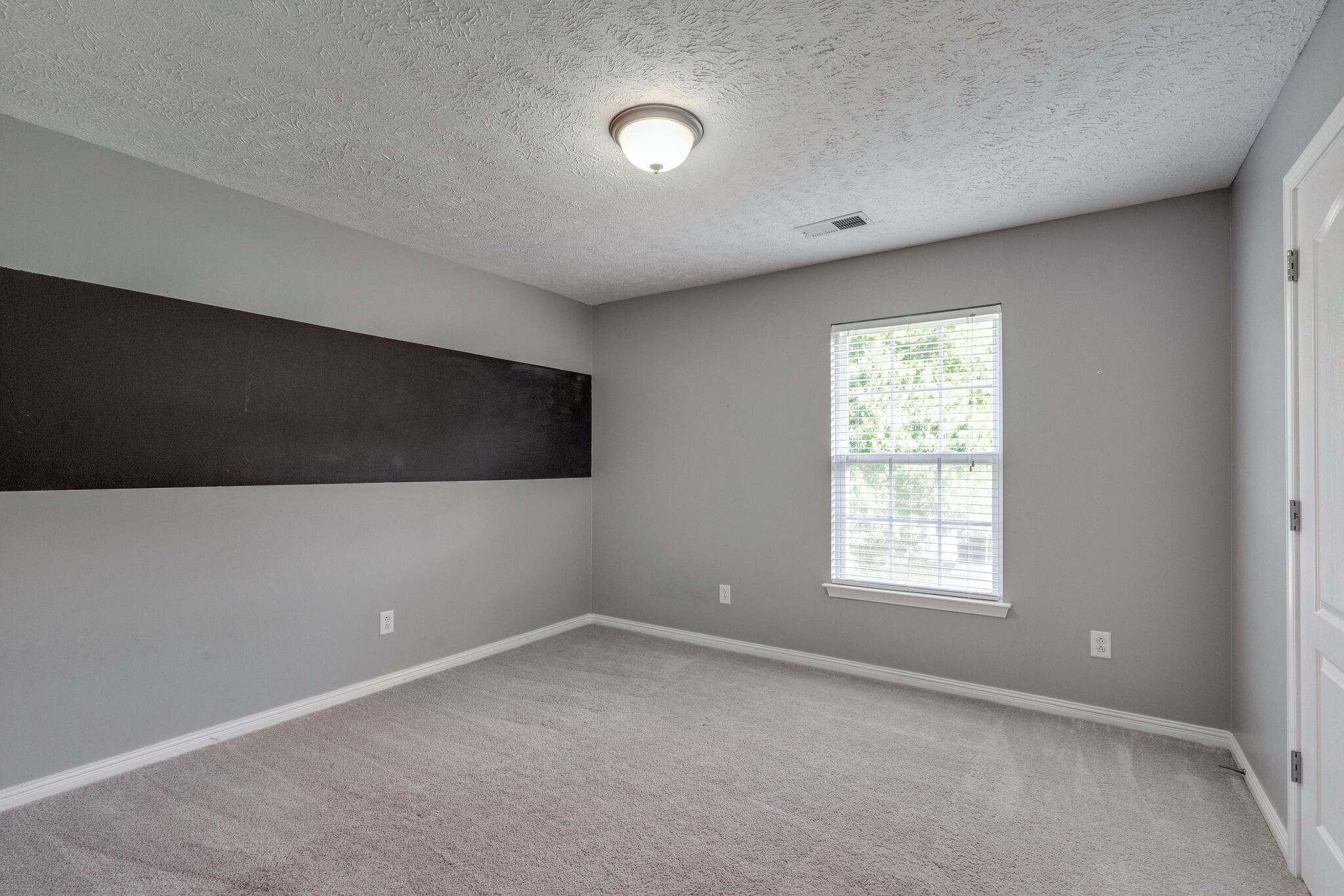 306 Cherry Drive Franklin, TN 37064 - Photo 25 of 30 an empty room with a empty space and windows