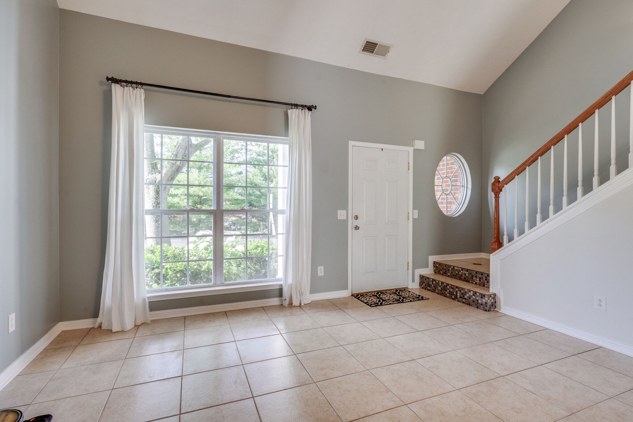 306 Cherry Drive Franklin, TN 37064 - Photo 6 of 30 a view of an empty room with a window