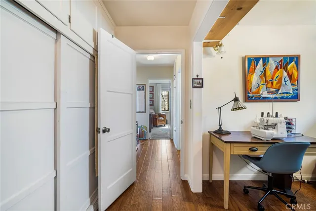 a view of a workspace with furniture