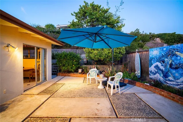 a view of a house with a garden
