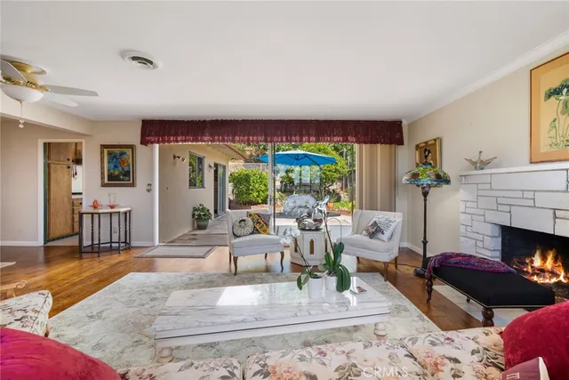 a kitchen with stainless steel appliances granite countertop a sink and a stove