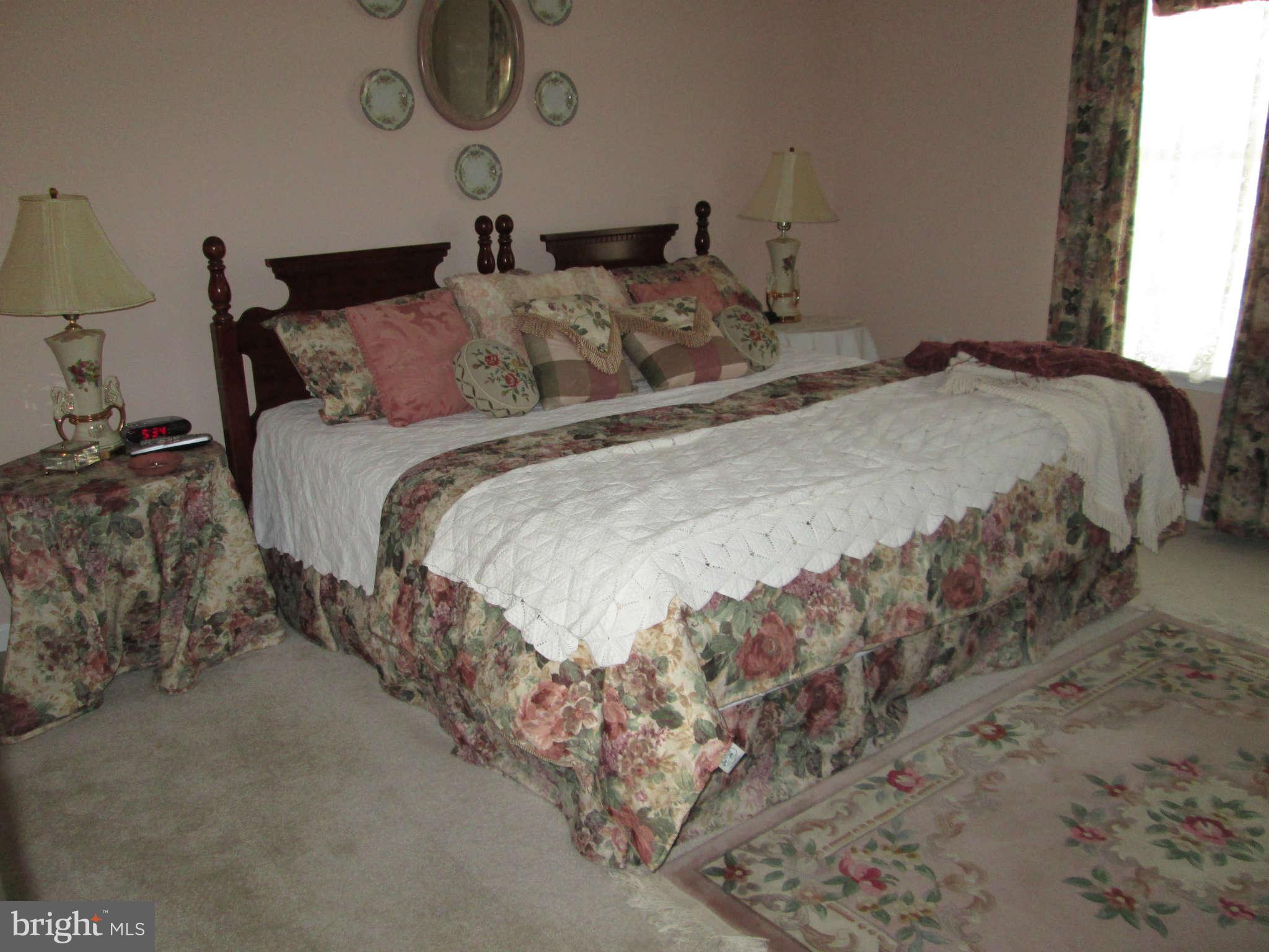 2985 Kabletown Road Charles Town, WV 25414 - Photo 13 of 22 a bedroom with bed and window