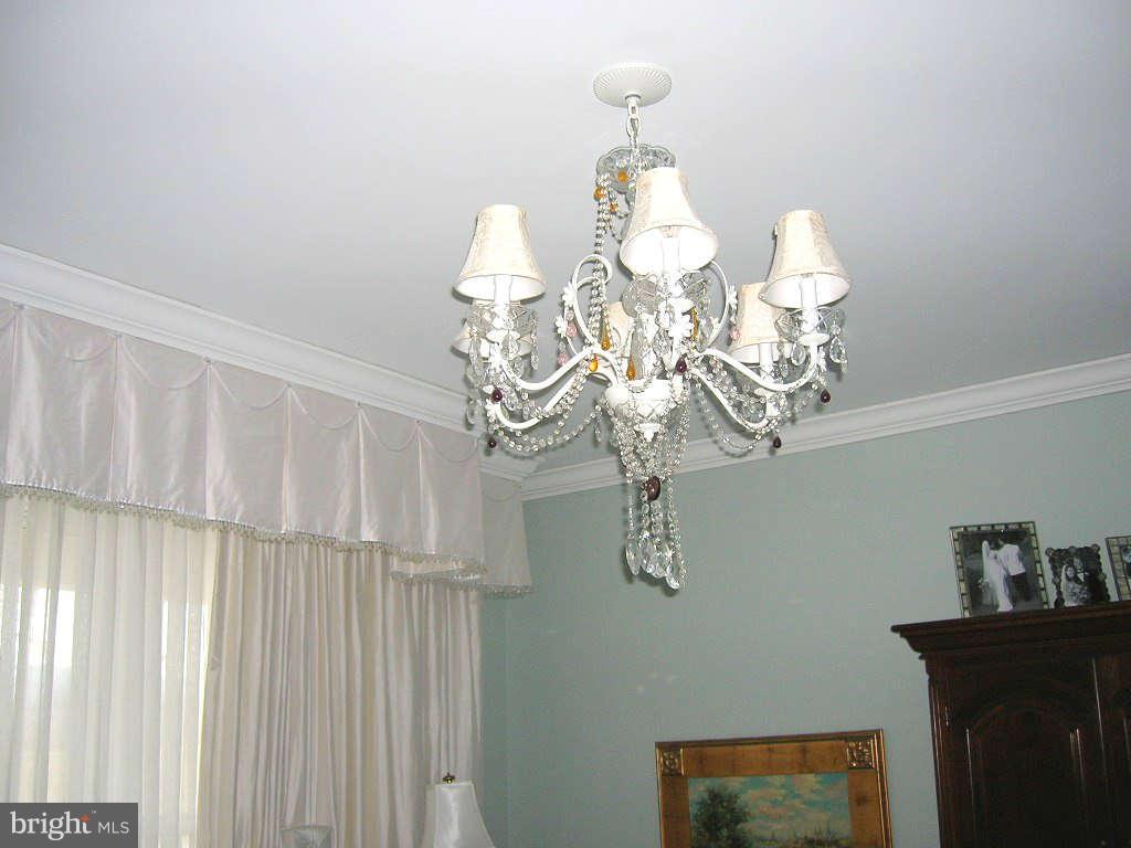 2985 Kabletown Road Charles Town, WV 25414 - Photo 21 of 22 a view of a chandelier in a room