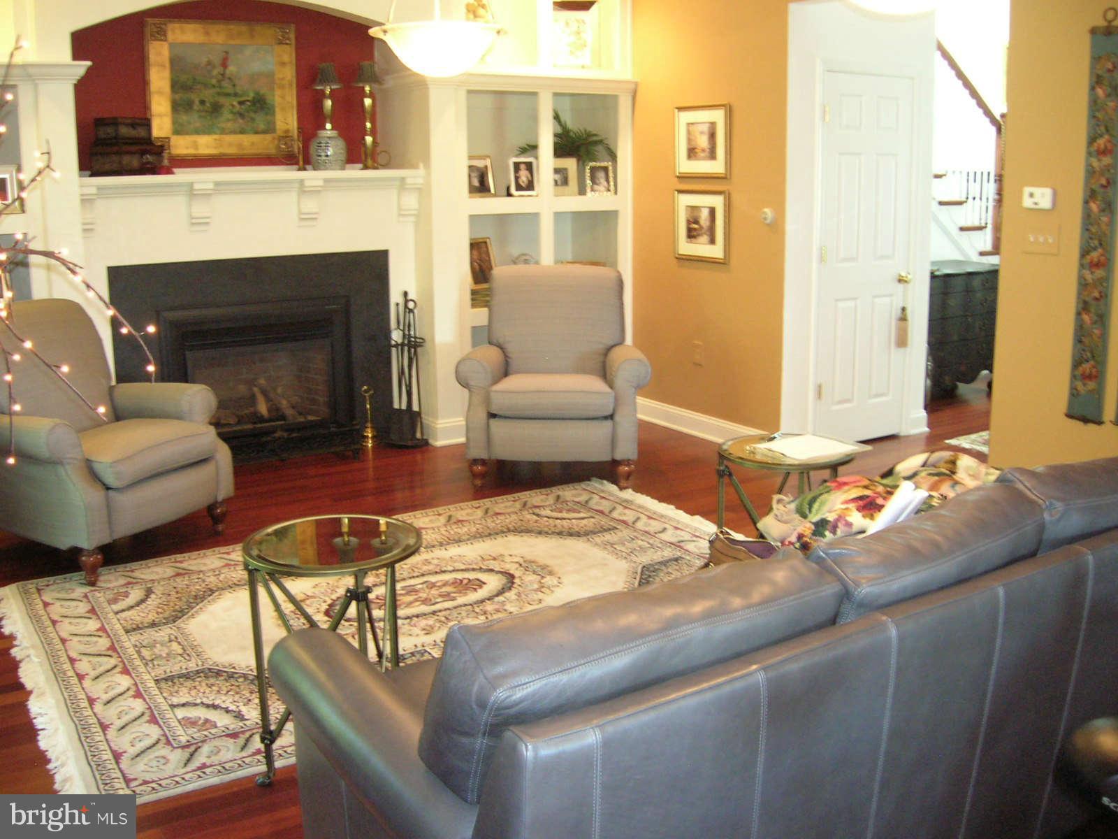 2985 Kabletown Road Charles Town, WV 25414 - Photo 5 of 22 a living room with furniture and a fireplace