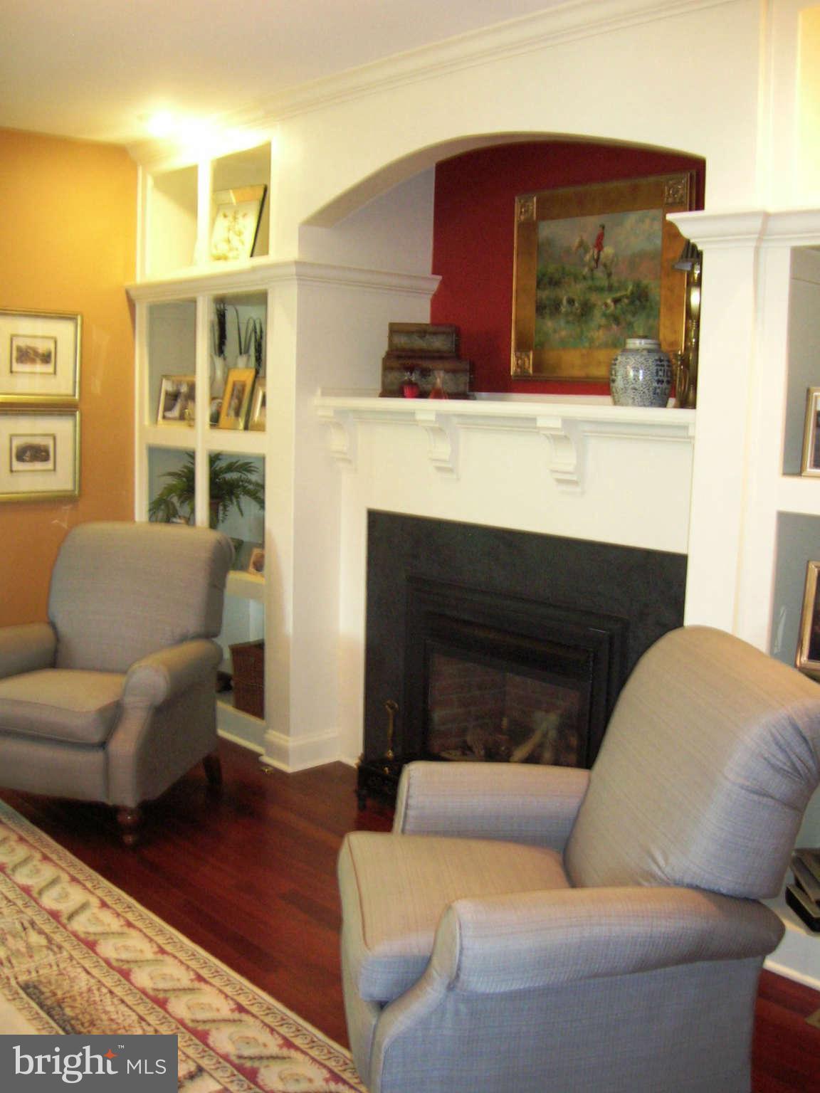 2985 Kabletown Road Charles Town, WV 25414 - Photo 6 of 22 a living room with furniture and a fireplace
