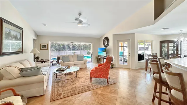 a kitchen with kitchen island a stove a sink and a refrigerator