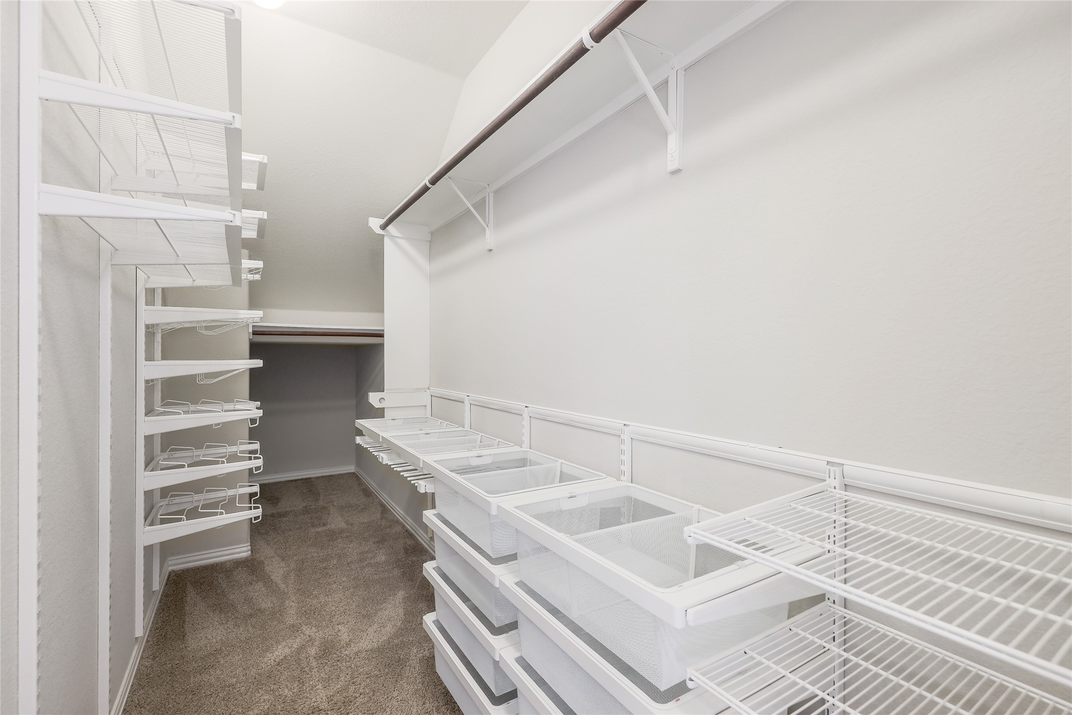 205 Penna Lane Georgetown, TX 78628 - Photo 18 of 32 Ample storage solutions define this practical and well-organized closet space.