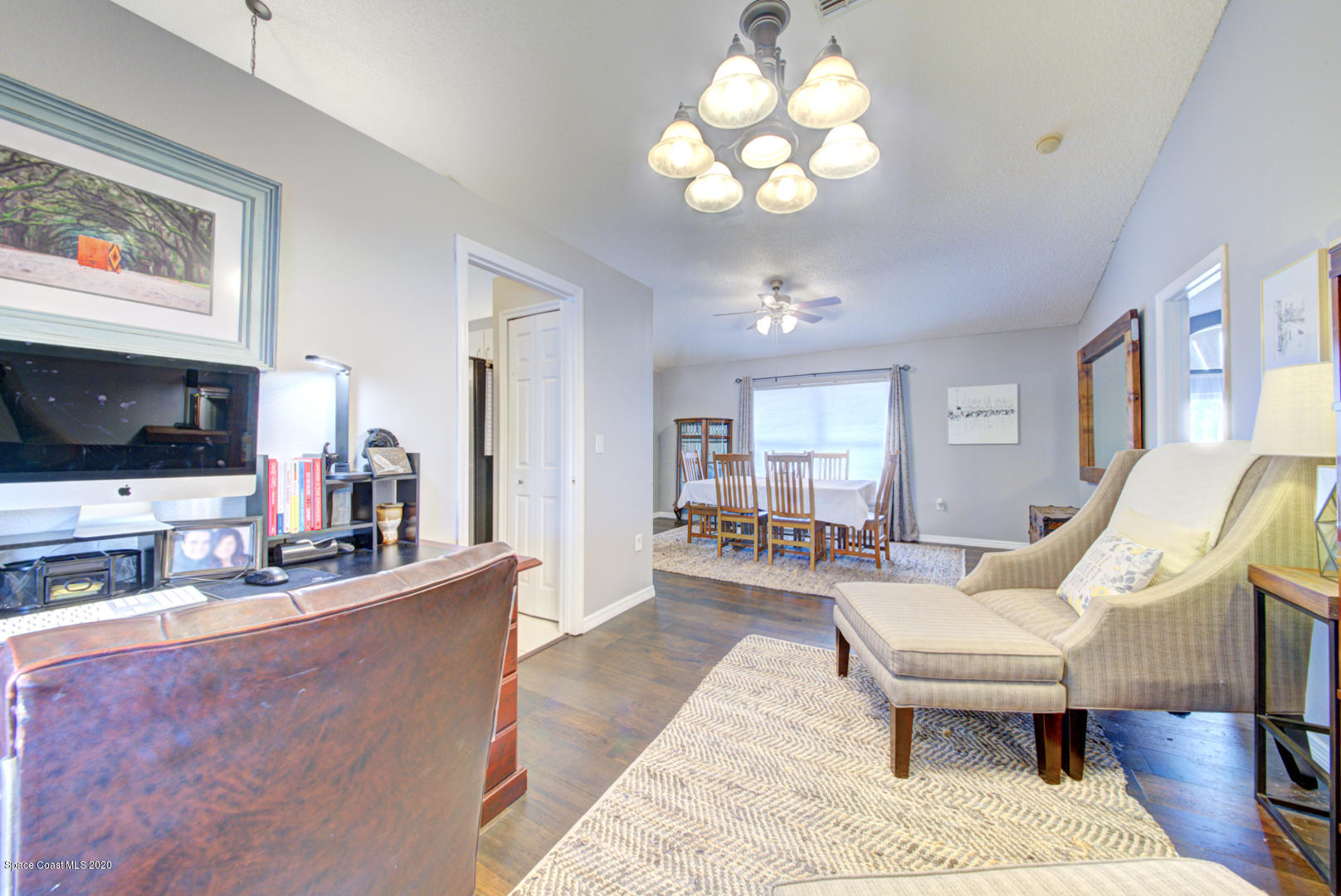 2380 High Ridge Road Palm Shores, FL 32935 - Photo 14 of 58 living room with chandelier
