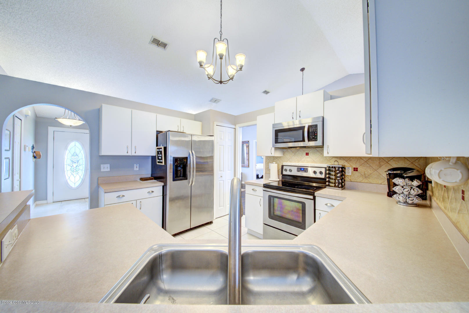 2380 High Ridge Road Palm Shores, FL 32935 - Photo 16 of 58 kitchen view from bar