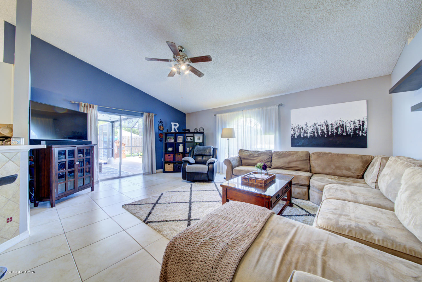 2380 High Ridge Road Palm Shores, FL 32935 - Photo 24 of 58 family room with fan