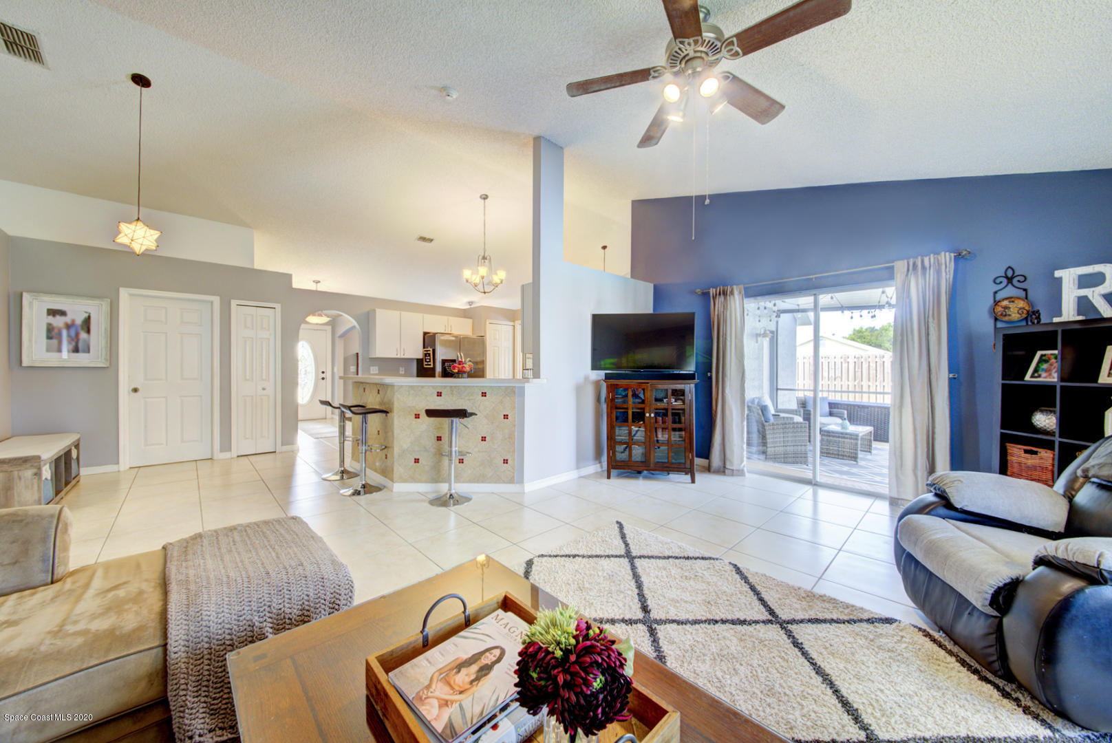 2380 High Ridge Road Palm Shores, FL 32935 - Photo 25 of 58 family room with sliders to lanai