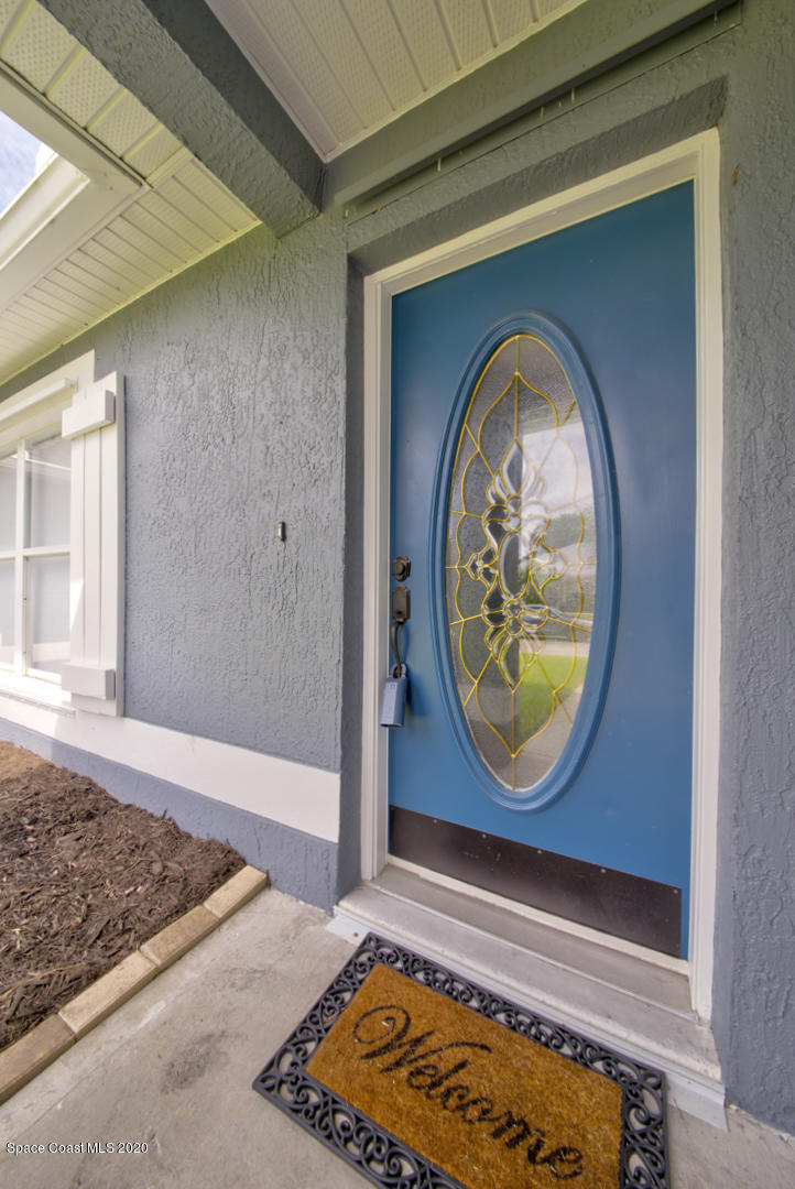 2380 High Ridge Road Palm Shores, FL 32935 - Photo 4 of 58 front door