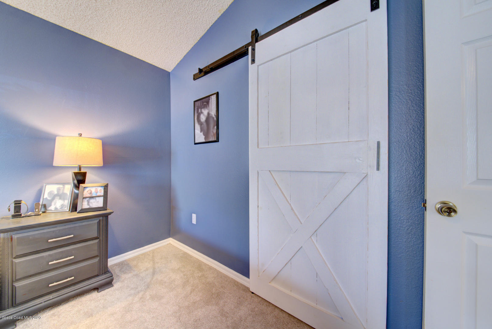 2380 High Ridge Road Palm Shores, FL 32935 - Photo 31 of 58 master bedroom barn door