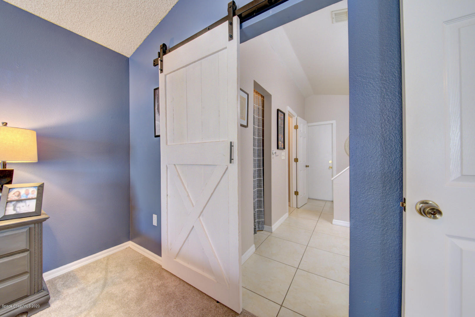 2380 High Ridge Road Palm Shores, FL 32935 - Photo 32 of 58 master bedroom with barn door