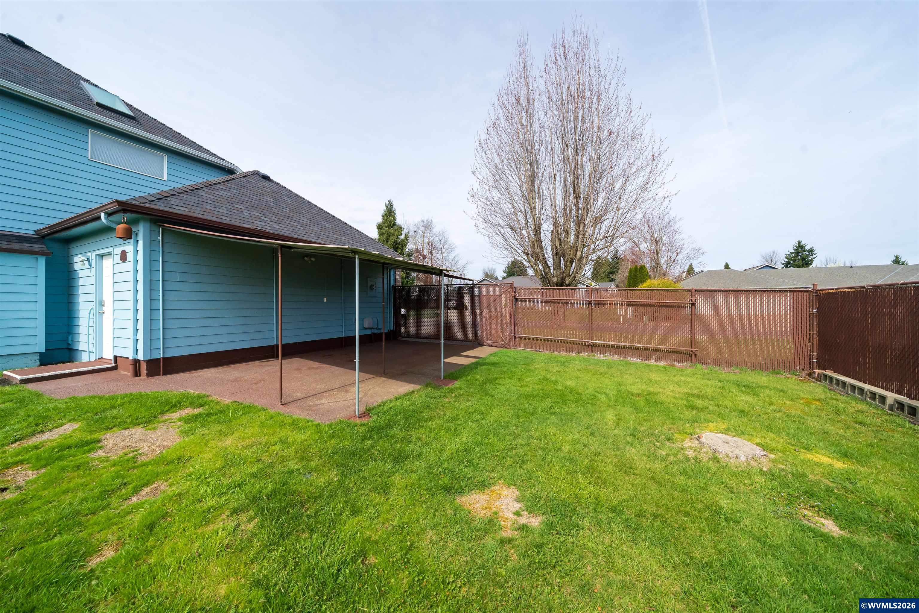 312 Southwest Cascade Meadow Drive Sublimity, OR 97385 - Photo 40 of 42 a view of a backyard with a garden