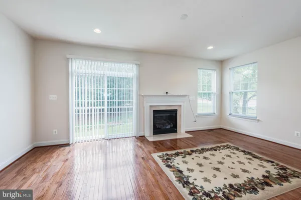 a view of kitchen and wooden floor