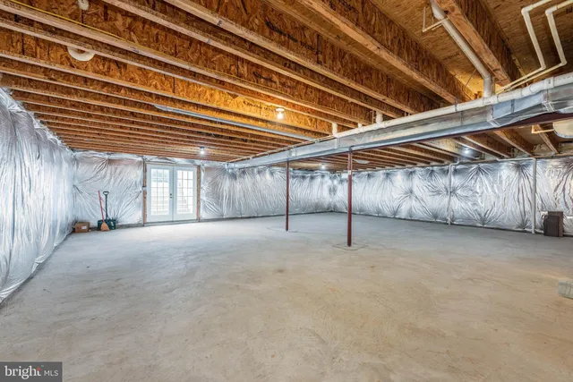a house with a big yard and large trees