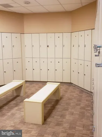 a view of a balcony and a dining table and chairs