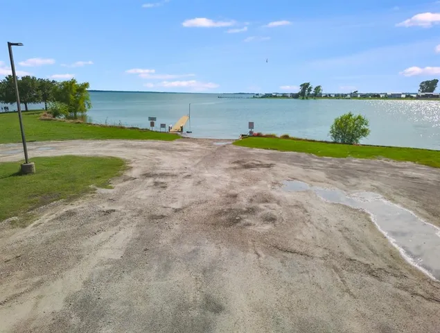 a view of a lake with a big yard