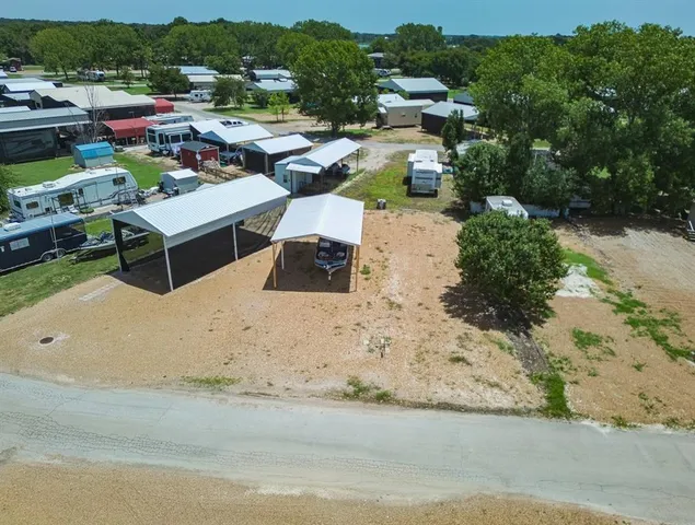 a view of a backyard with couches and city view