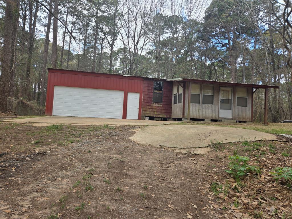 1267 Johnson Road Doyline, LA 71023 - Photo 2 of 4 View of front of property with a garage