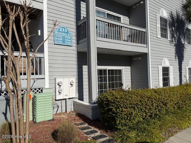 215 Royal Poste Road, Unit 2702 Sunset Beach, NC 28468 - Photo 1 of 21 front of building
