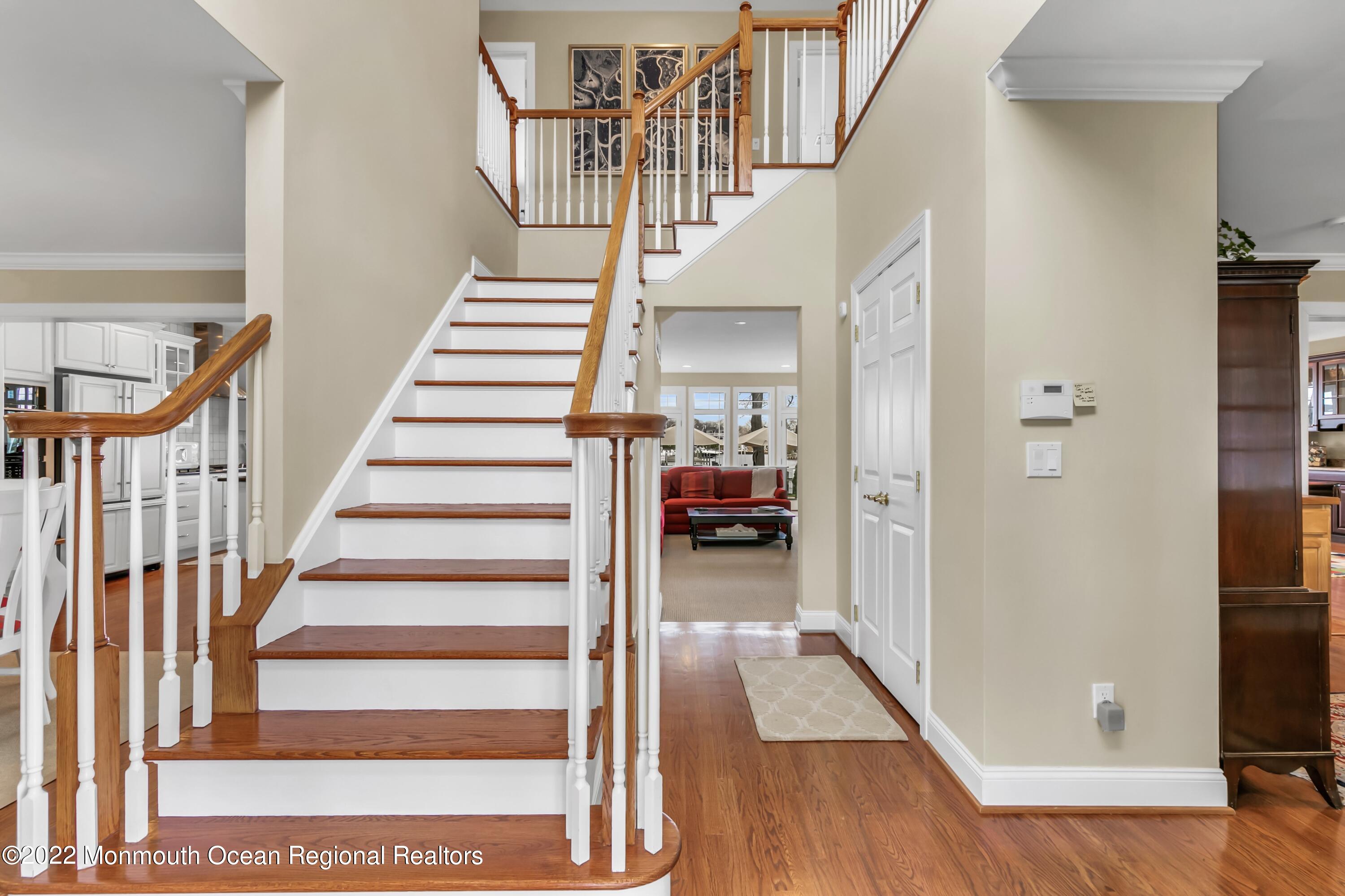 574 Harbor Road Brick, NJ 08724 - Photo 20 of 65 a view of entryway and hall with wooden floor