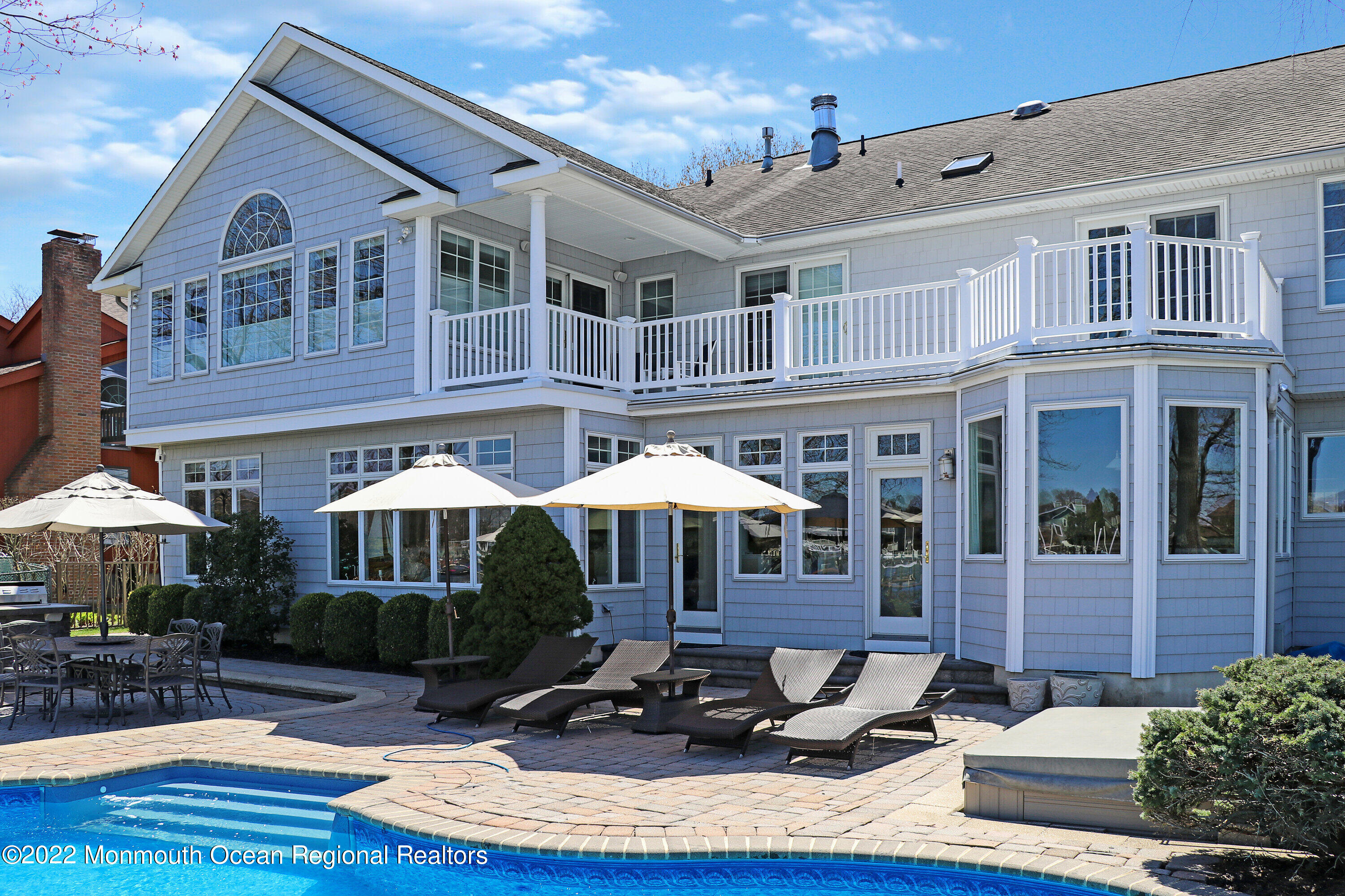574 Harbor Road Brick, NJ 08724 - Photo 2 of 65 a front view of a house with yard and patio