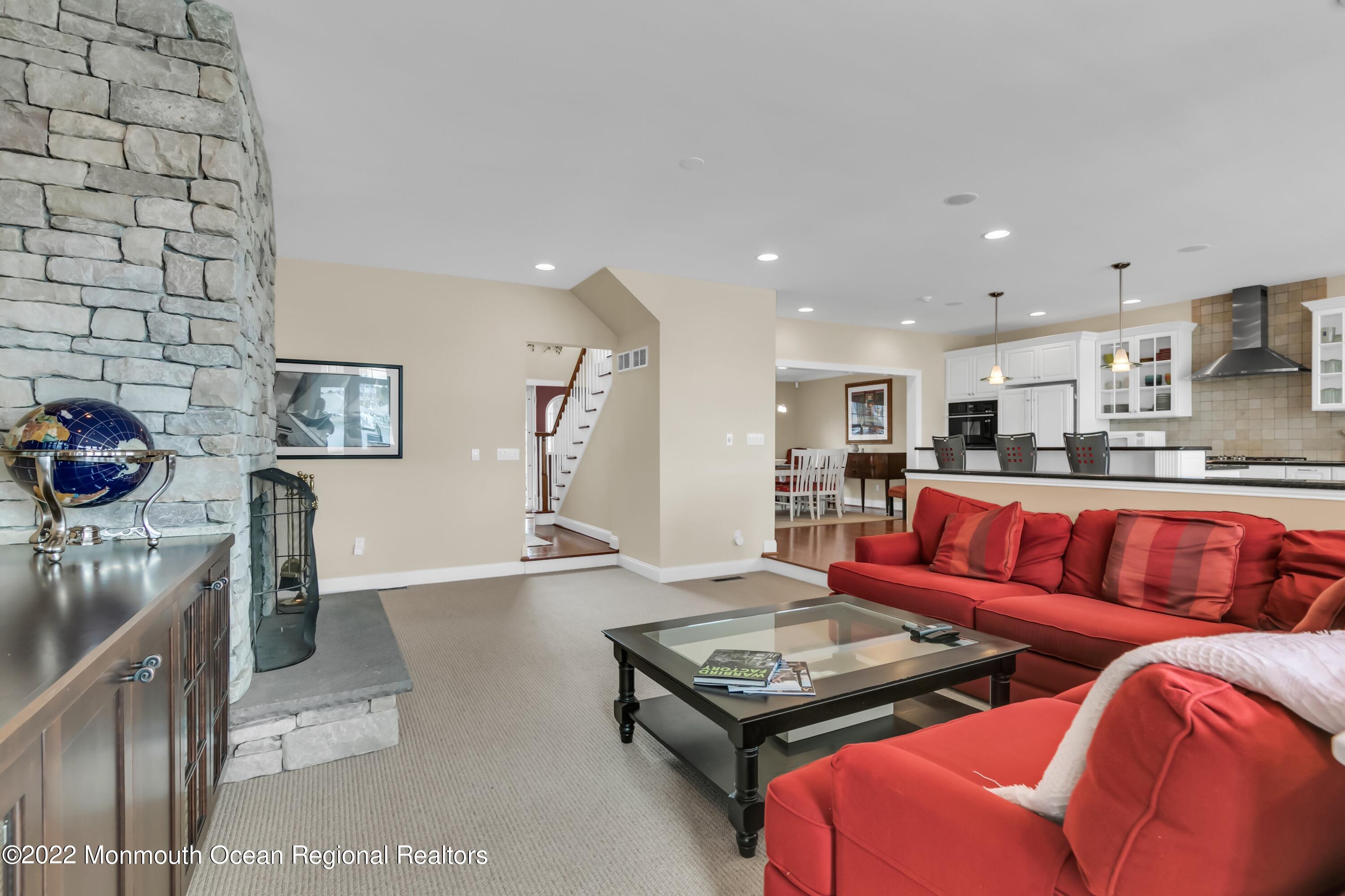 574 Harbor Road Brick, NJ 08724 - Photo 31 of 65 a living room with furniture and a table
