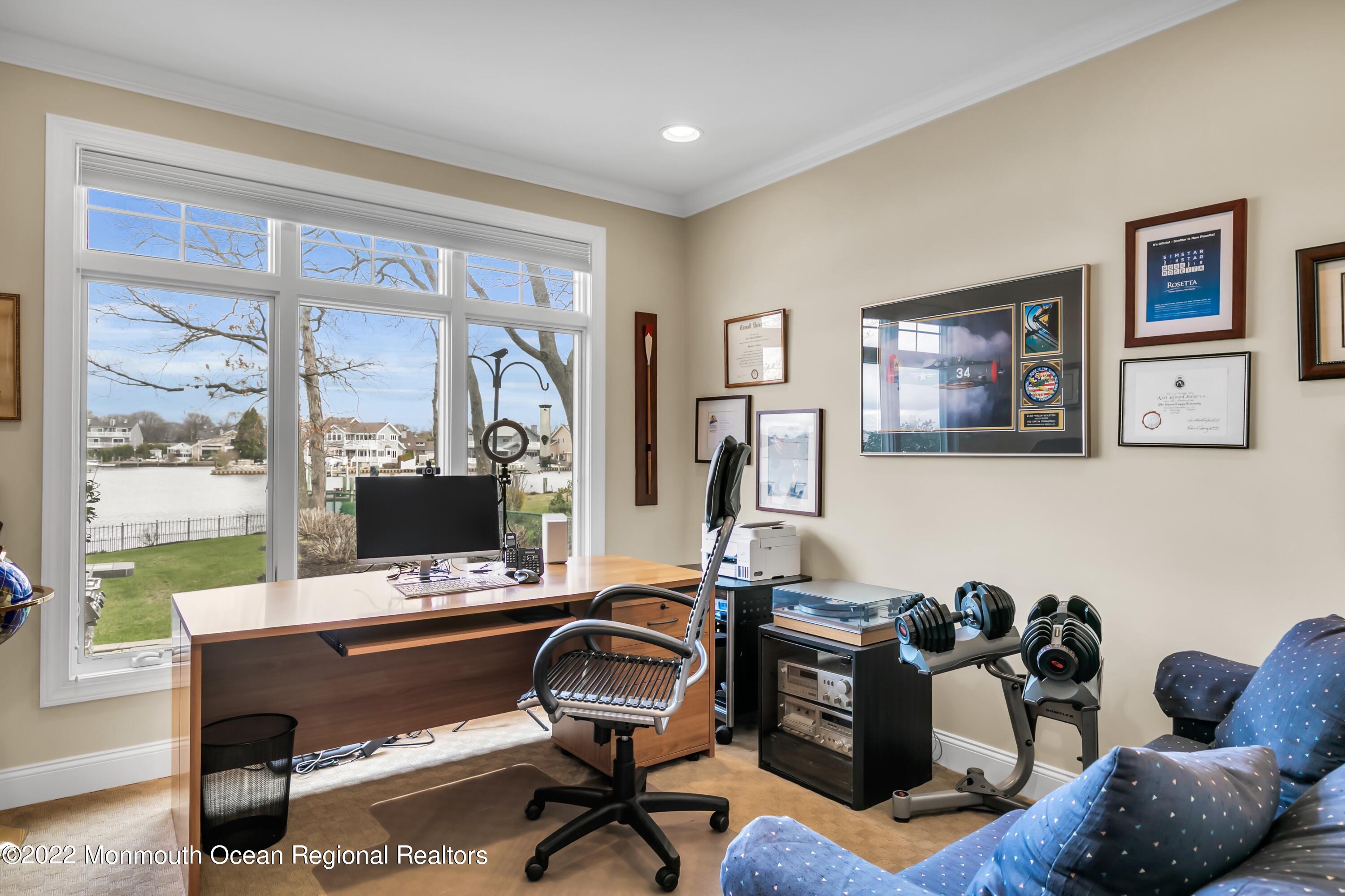 574 Harbor Road Brick, NJ 08724 - Photo 39 of 65 a view of a workspace with furniture and a window