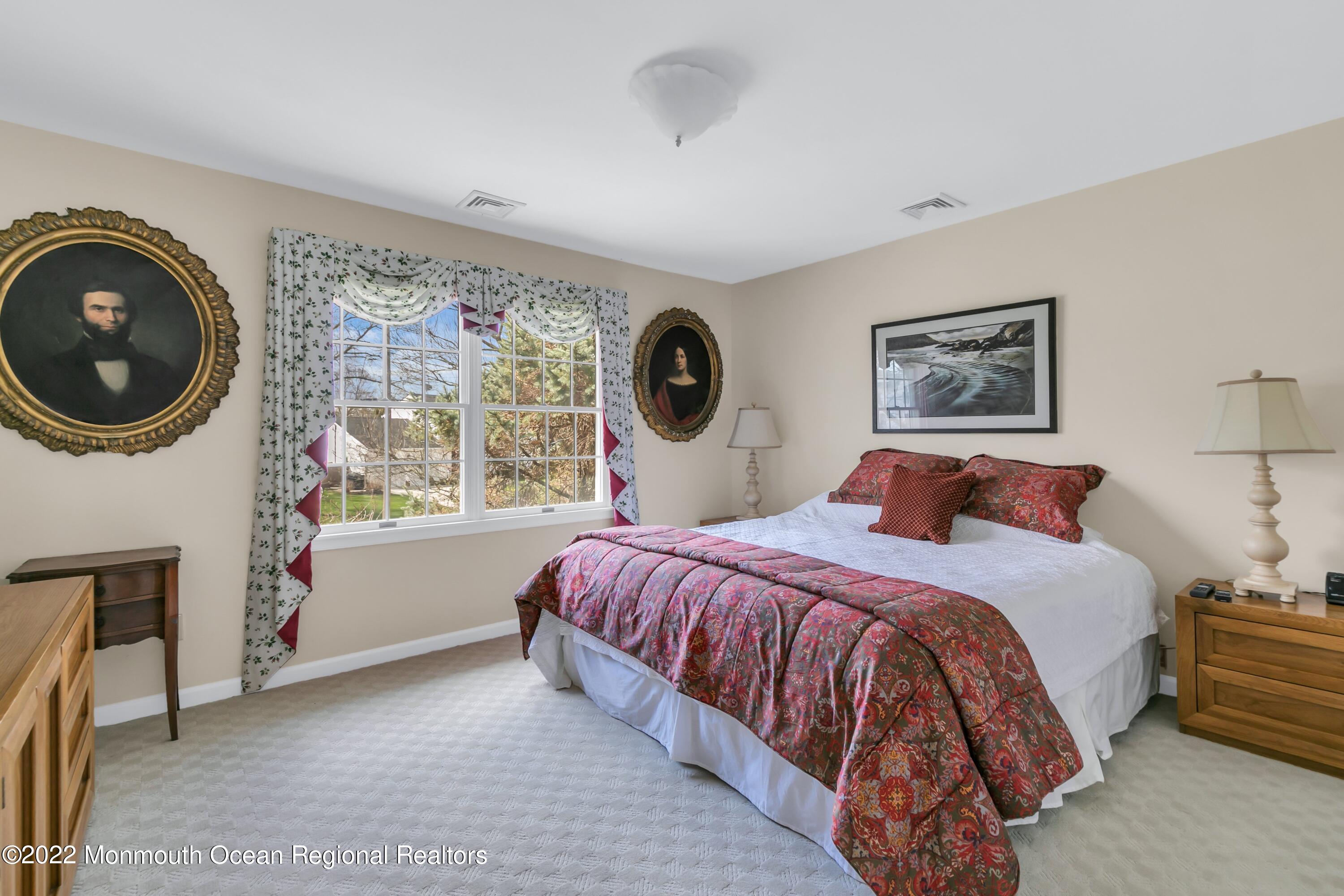 574 Harbor Road Brick, NJ 08724 - Photo 50 of 65 a bedroom with a bed and a window