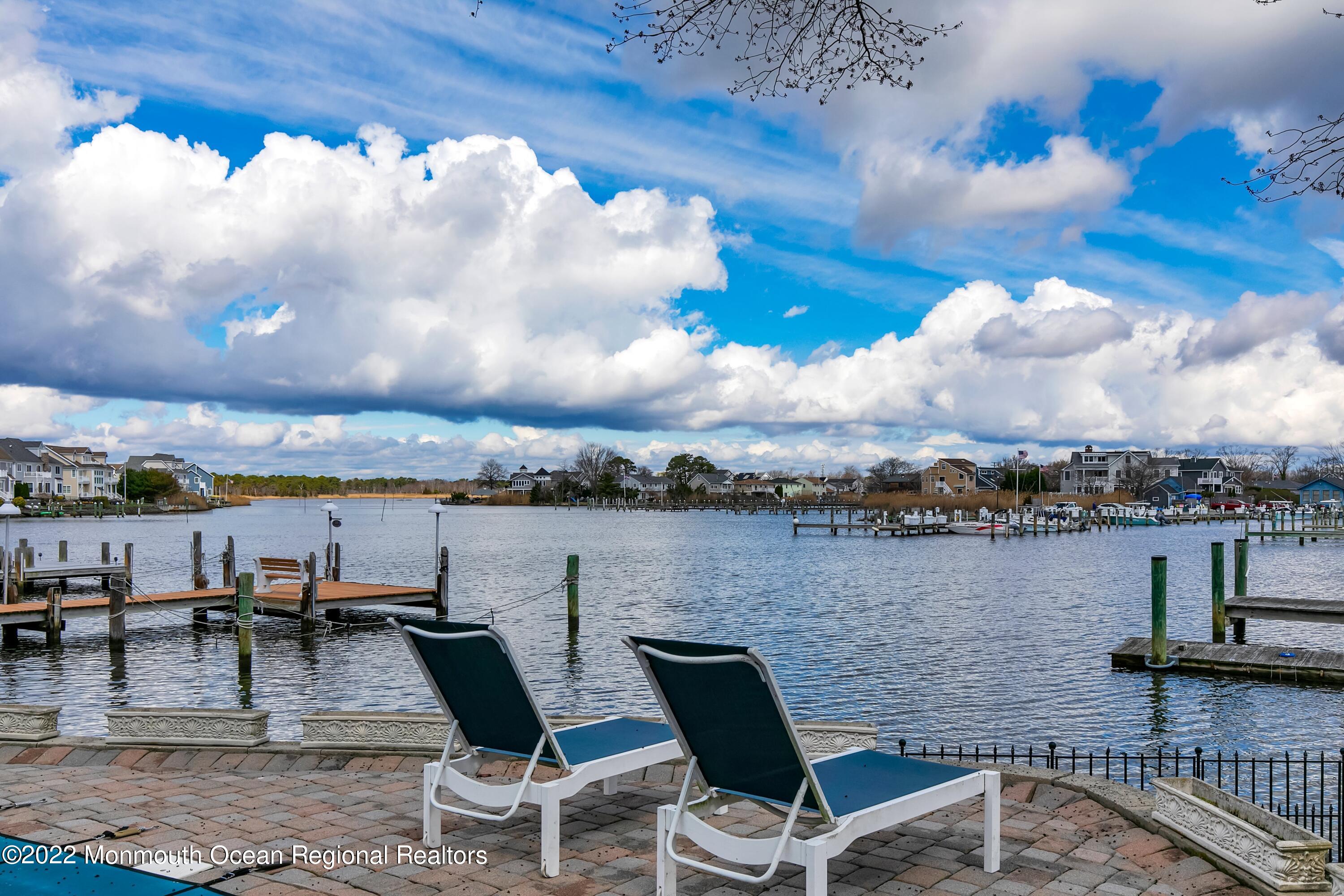 574 Harbor Road Brick, NJ 08724 - Photo 5 of 65 a view of a terrace with sitting area