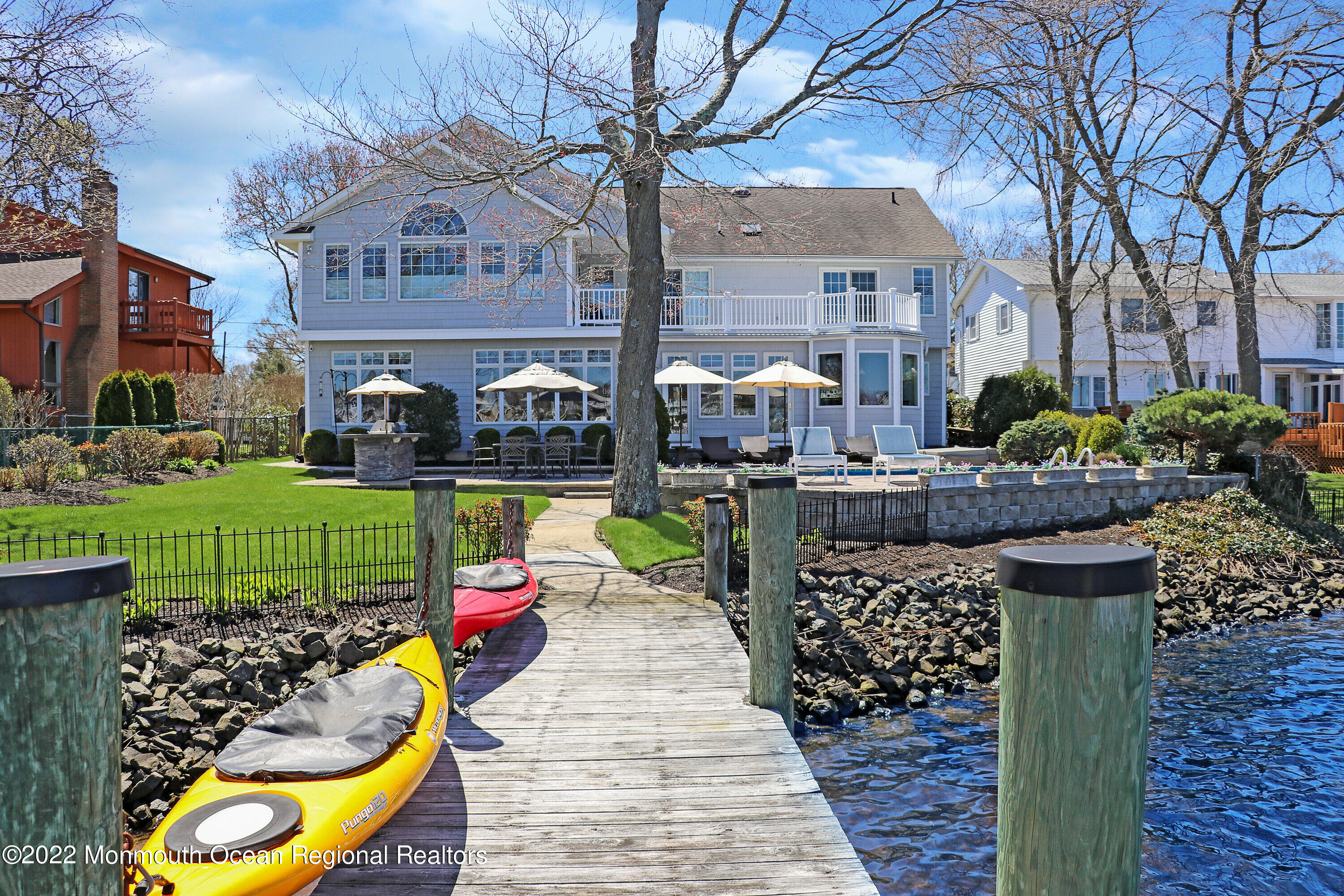 574 Harbor Road Brick, NJ 08724 - Photo 9 of 65 a swimming pool with outdoor seating and yard