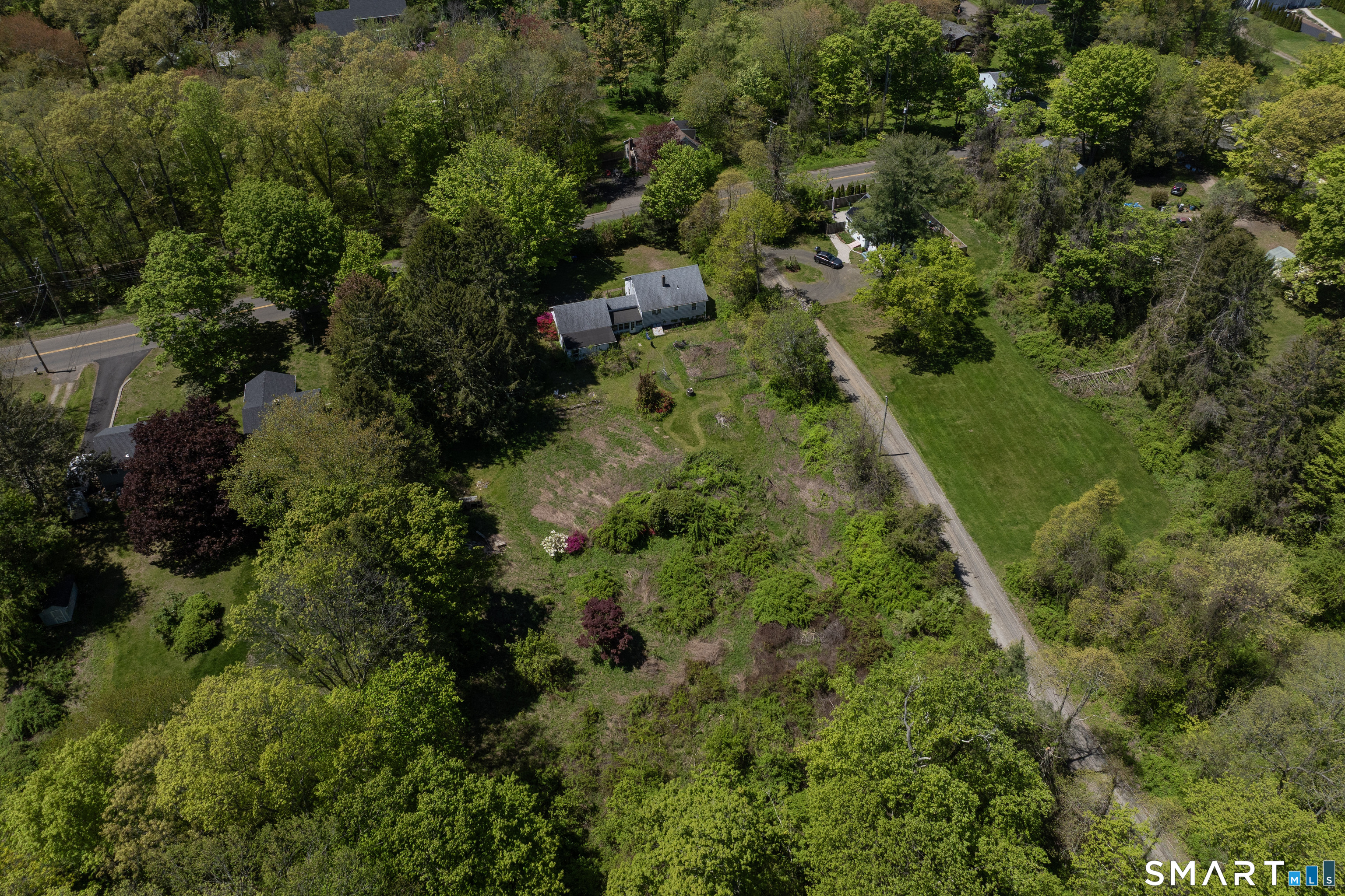 1973 Long Hill Road Guilford, CT 06437 - Photo 2 of 19 a view of a garden
