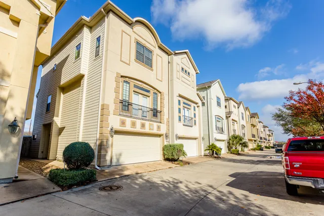a view of a building with a street