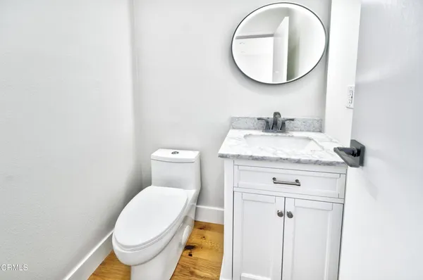 a bathroom with a toilet and a sink