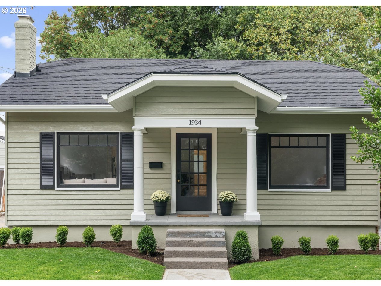 1934 Northeast 55th Avenue Portland, OR 97213 - Photo 1 of 23 a house that has a lot of windows on it