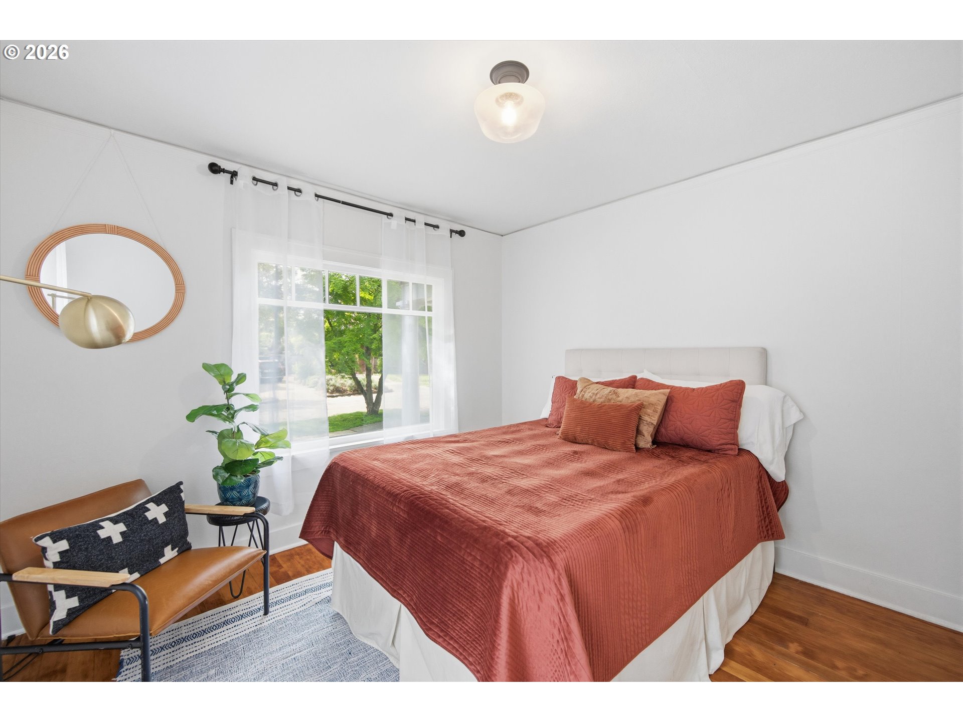 1934 Northeast 55th Avenue Portland, OR 97213 - Photo 14 of 23 a bedroom with a bed and a window