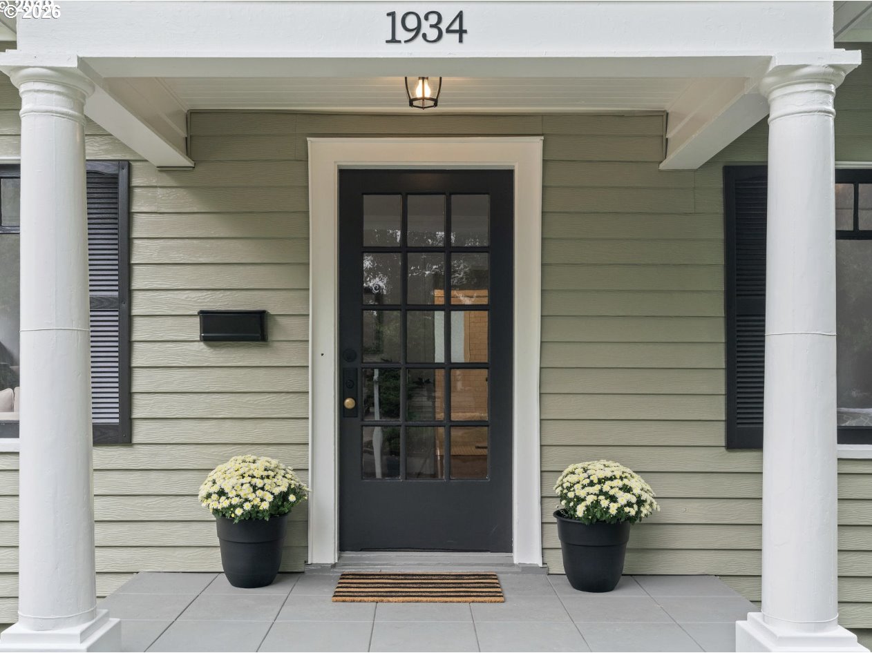 1934 Northeast 55th Avenue Portland, OR 97213 - Photo 2 of 23 a front view of a house with a potted plant