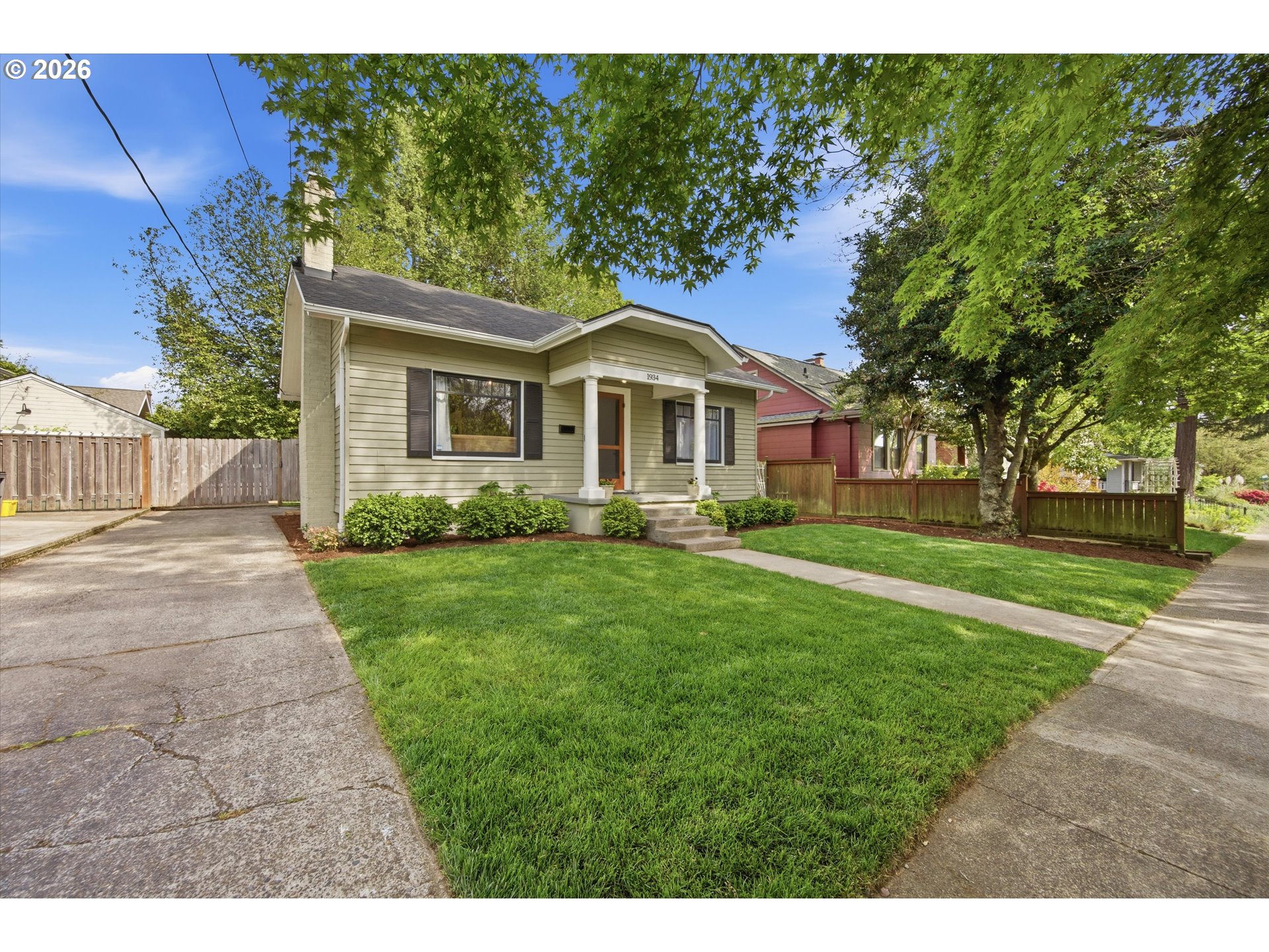 1934 Northeast 55th Avenue Portland, OR 97213 - Photo 3 of 23 a front view of a house with a yard