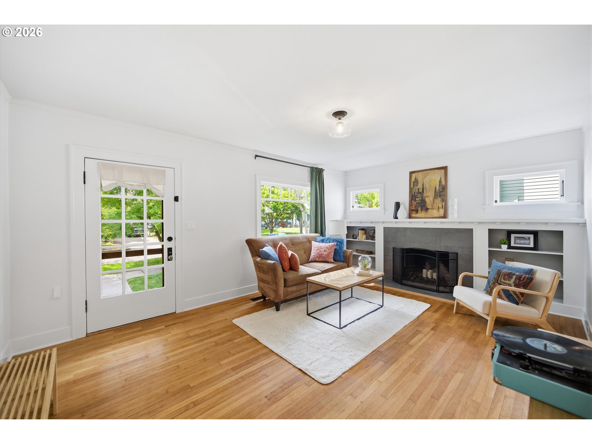 1934 Northeast 55th Avenue Portland, OR 97213 - Photo 5 of 23 a living room with furniture and a fireplace
